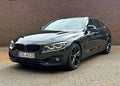 BMW 440i Gran Coupé Sport Line noir — avant