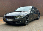 BMW 440i Gran Coupé Sport Line noir — avant
