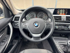 BMW 320d — sièges arrière