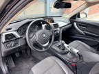 BMW 320d — coffre Touring