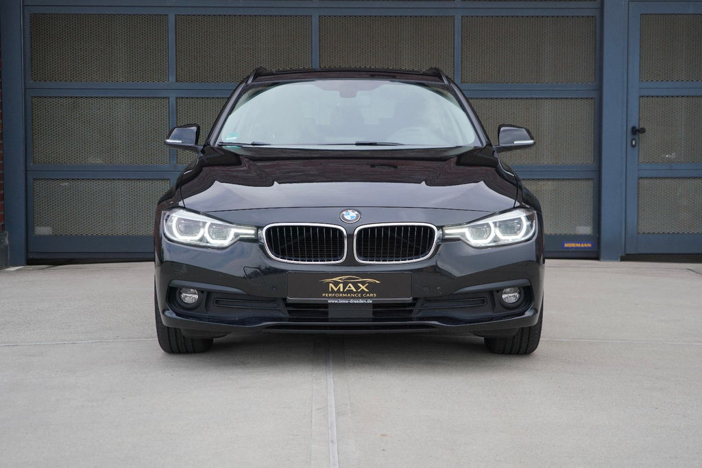 BMW 320d Touring — trois quarts arrière